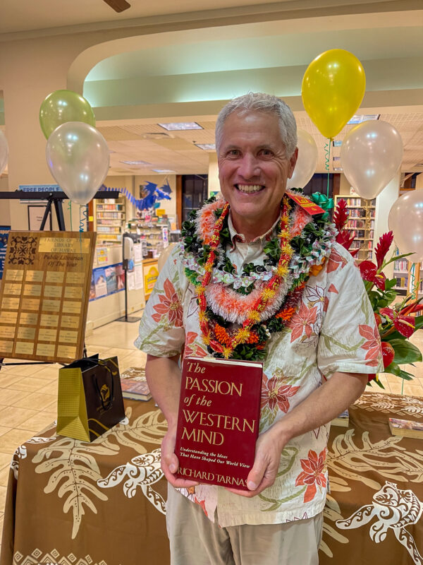 Rep. Tarnas with book